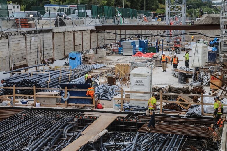 Huge construction site below street level.