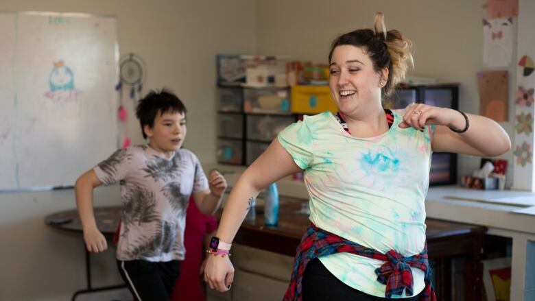 Kids dance to a Zumba workout.