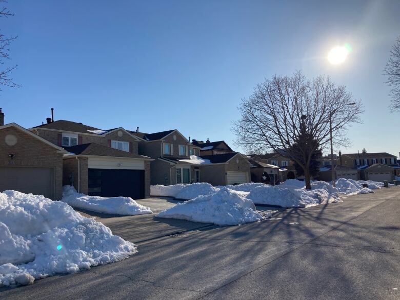 A row of houses on a snow-covered residential street in Scarborough. This is wher ea home was sold without the owner's knowledge.