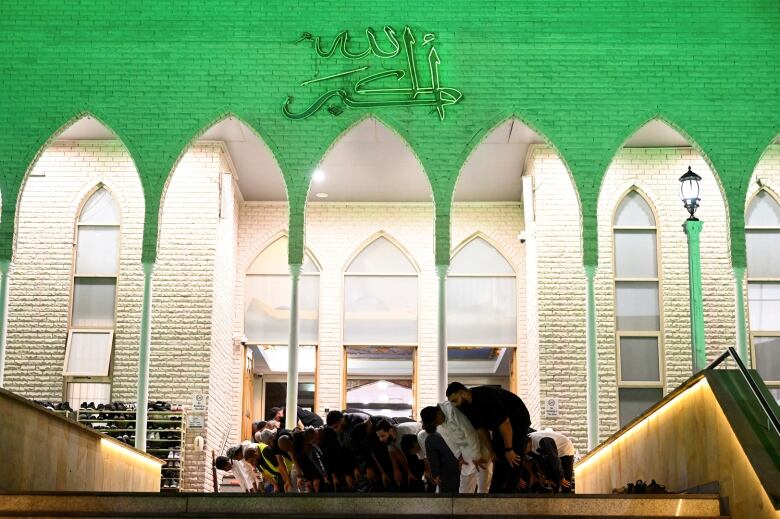 Worshippers pray at a mosque