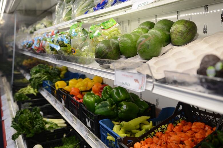 vegetables on a refrigerated shelf