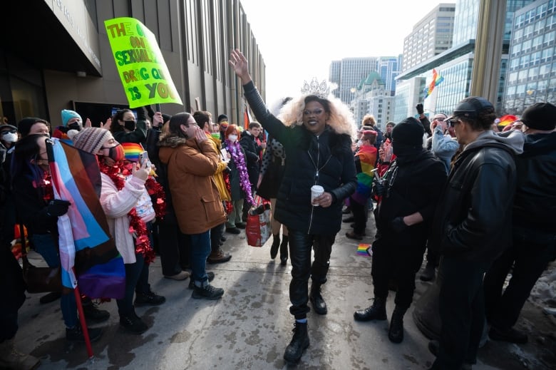 Drag performer Aimee Yonce makes her way to the National Arts Centre (NAC) ahead of a 'Drag Story Time' event hosted by Capital Pride and the Ottawa Public Library in Ottawa, on Wednesday, Feb. 8, 2023. THE CANADIAN PRESS/Spencer Colby