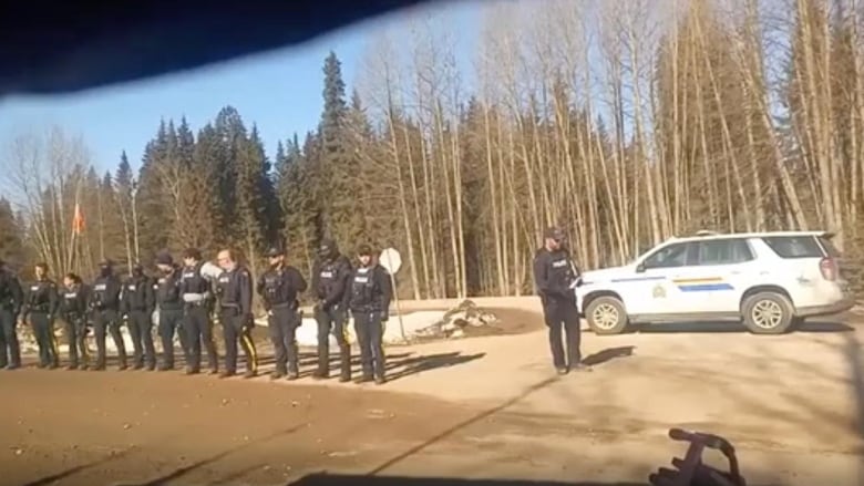 A line of RCMP officers.