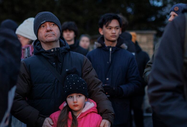 Community members, classmates and teachers form a procession at High Park, near  Keele Subway station, in Toronto, on March 30, 2023. Gabriel Magalhaes, 16, was fatally stabbed at the station on March 25. 