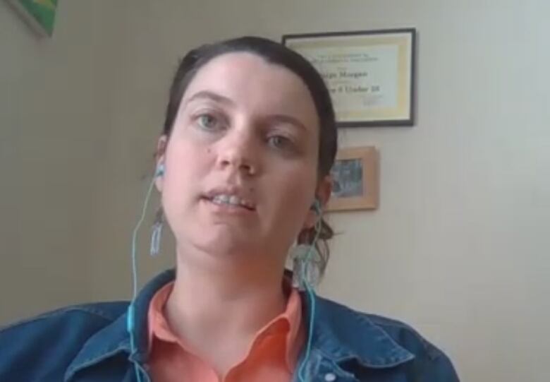 A woman is pictured in an office.