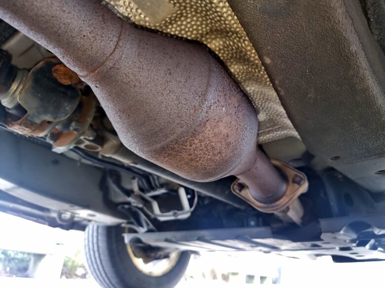 A catalytic converter underneath a vehicle in Surrey B.C.