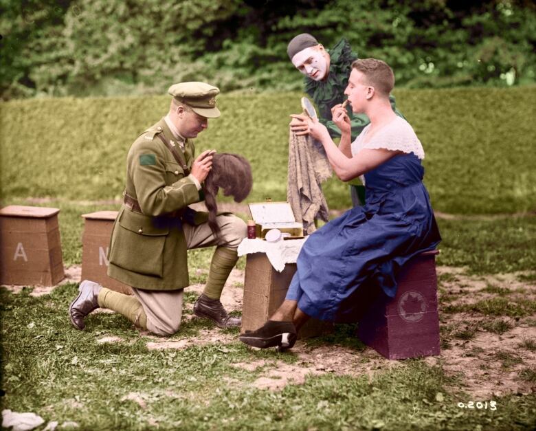 A photo of soldiers dressing in drag at a concert in France in September 1917, during World War I.