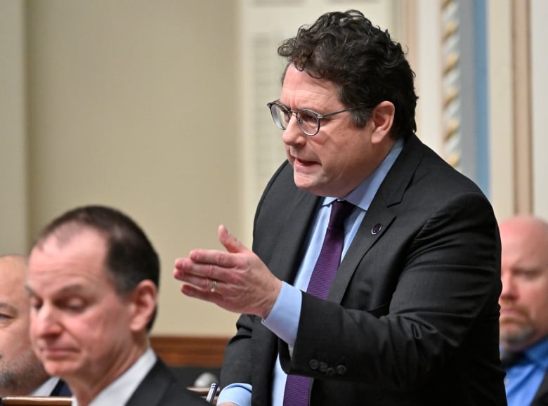 Quebec Education Minister Bernard Drainville responds to the Opposition during question period at the legislature in Quebec City.