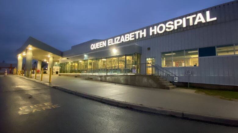 Queen Elizabeth Hospital at night.