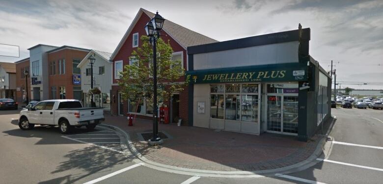 A Google Streetview photo of downtown Summerside shows the relative locations of Philip Sullivan's Jewellery Plus and Seaside Bookshop, behind the tree.