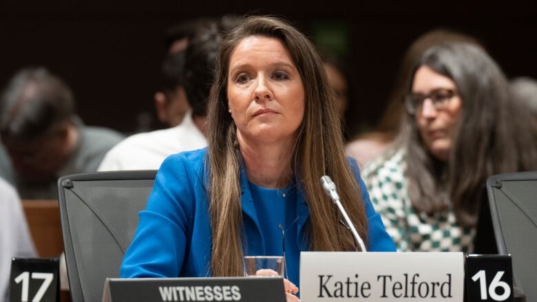 A photograph of Katie Telford giving evidence to a committee of MPs. 