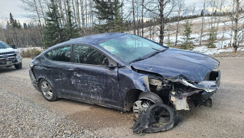 A damaged vehicle is shown.