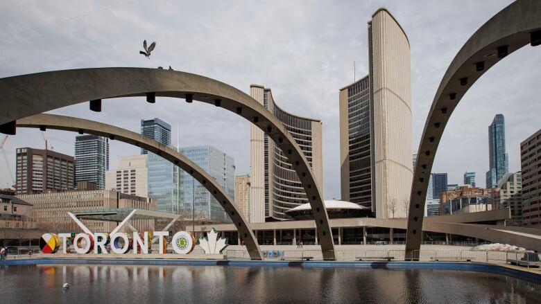 Toronto city hall seen behind Nathan Phillips Square.