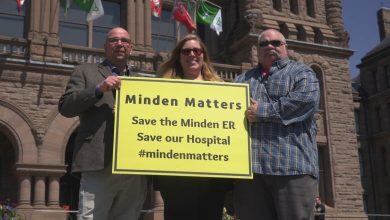 Minden residents want the Ontario government to delay the closure of the emergency department in their community. Patrick Porzuczek, left, Laura Porzuczek, middle, Richard Bradley, right.