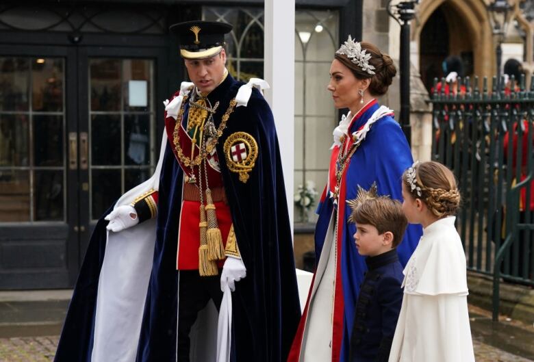 A royal couple and their two children.