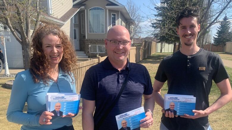 UCP candidate Searle Turton (centre) prepares to knock doors with campaign manager Bobbi Menard and volunteer Dylan Topal