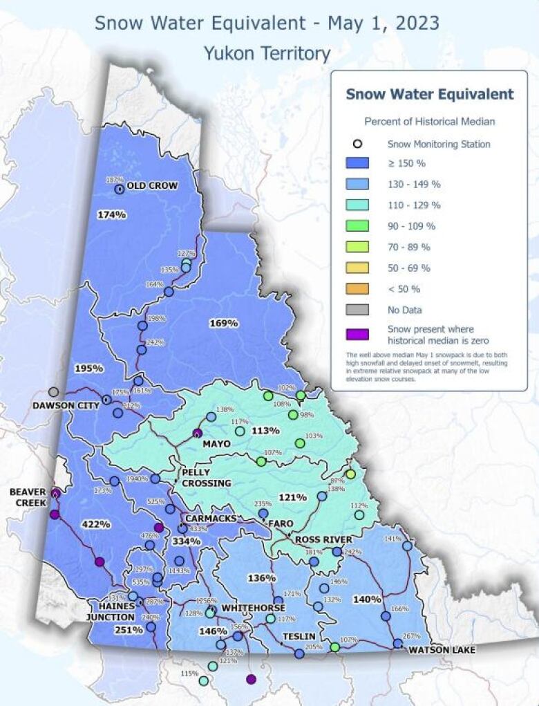 A map of the Yukon is coloured in different shades of blue to indicate snow water equivalent measurements for different regions. 