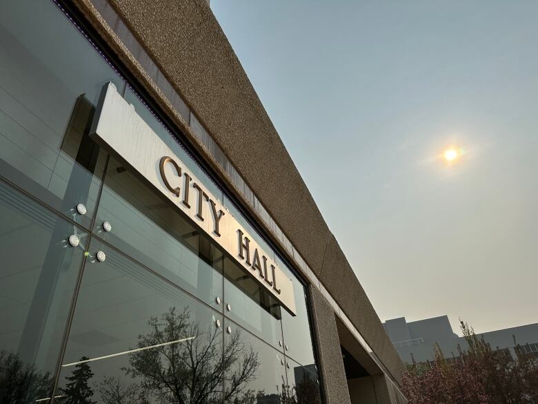 Regina city hall is covered in a haze on the morning of May 17, 2023.  