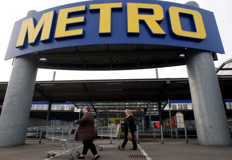 A storefront with a giant logo which says 'Metro' is shown.