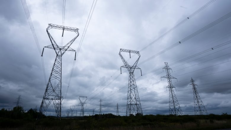 Power lines are seen against cloudy skies near Kingston, Ont. , Wednesday, Sept. 7, 2022 in Ottawa. 