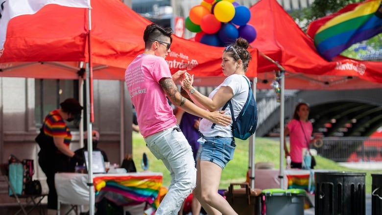 Two people dance 