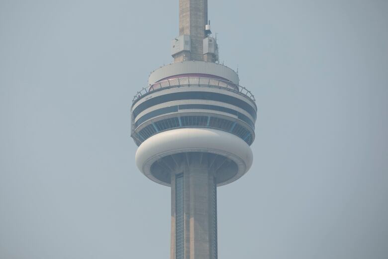 The CN Tower, enveloped by haze.