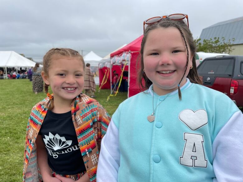 Mika Jadis and Mia Knockwood at pow wow.