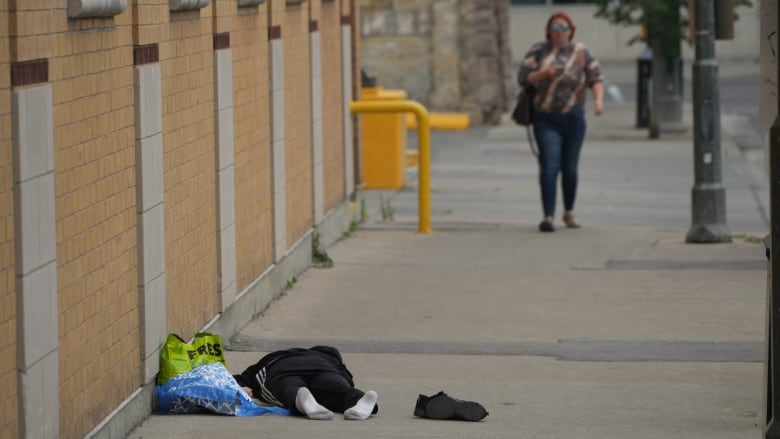 Someone lying in the streets