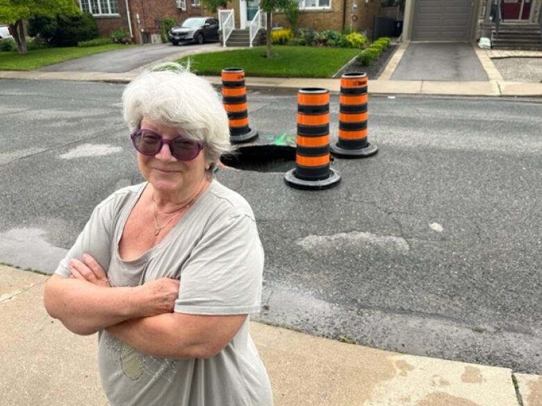 Glen Albert Drive resident Laurel Brown wants to know what caused the sinkhole, and why it's taken the city so long to fix the problem. 