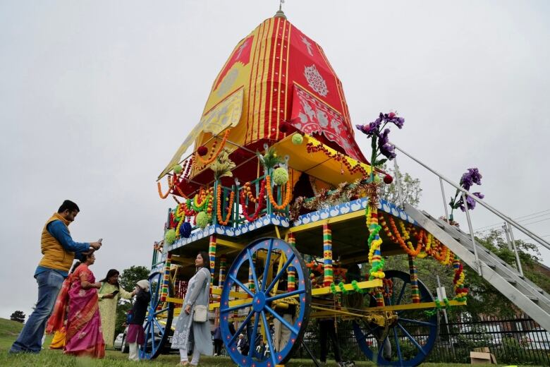 A giant colourful wooden chariot 