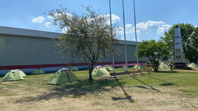 tents in front of building