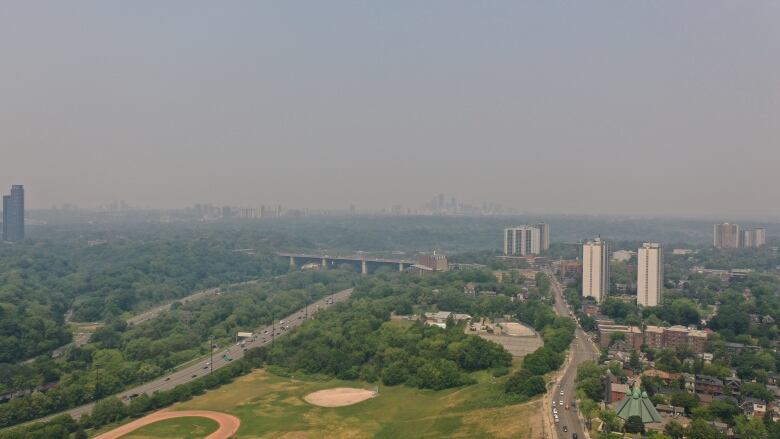 haze seen over highway and buildings