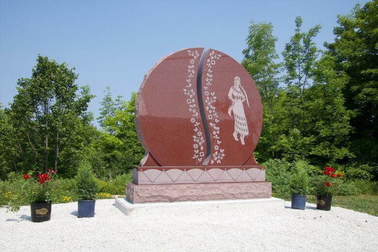 The red granite monument unveiled last Wednesday in Whitefish River First Nation is one of two MMIWG monuments being unveiled in Ontario this year.