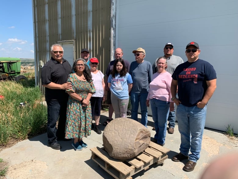 A group of people pose for a picture.