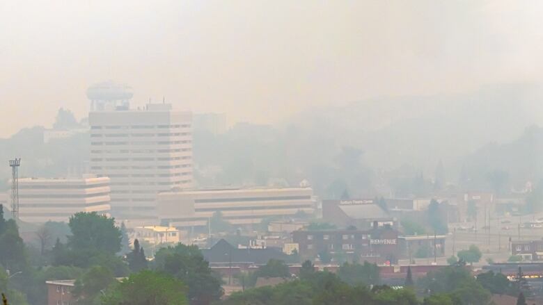 A landscape image of a smoky city.