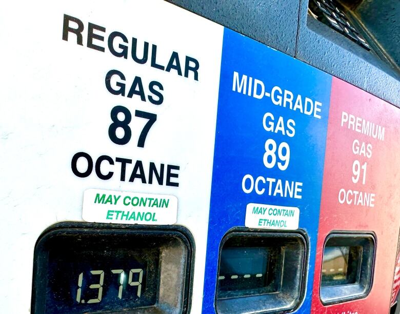 Prices are shown for different types of gasoline at a fuelling station.