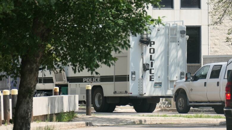 A large white police van. 