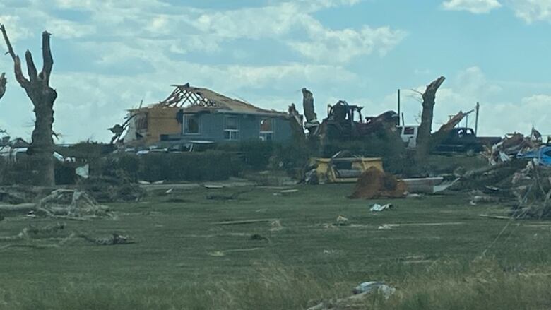 Houses damaged by a tornado are pictured. 