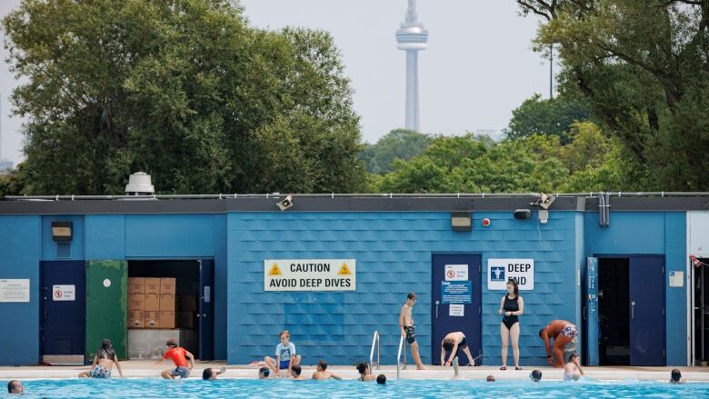 Bathers swim at Sunnyside Gus Ryder Outdoor Pool, on Torontos lakeshore, during a heatwave on July 20, 2022.