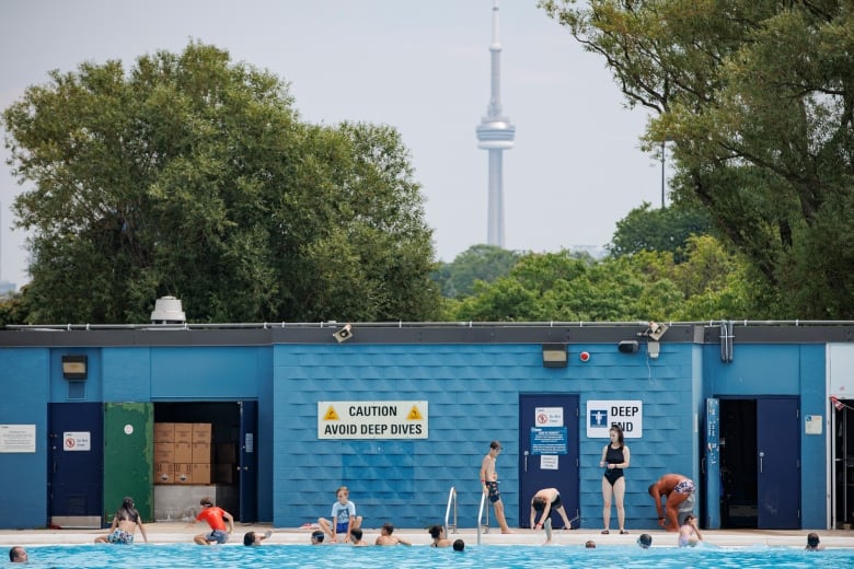 Bathers swim at Sunnyside Gus Ryder Outdoor Pool, on Torontos lakeshore, during a heatwave on July 20, 2022.