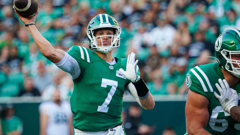 Saskatchewan Roughriders quarterback Trevor Harris (7) throws against the Edmonton Elks during the first half of CFL football action in Regina, on Thursday, July 6, 2023.