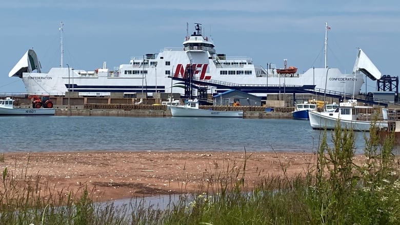 Confederation ferry at the dock in Wood Islands, with both vehicle bay doors up.