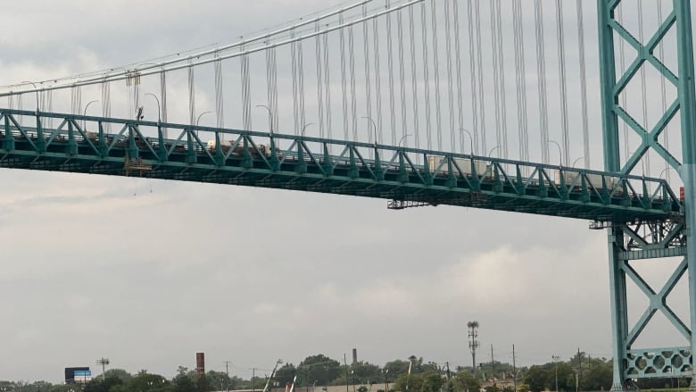 The Ambassador Bridge is shown approximately four hours after a worker fell from the crossing into the Detroit River.