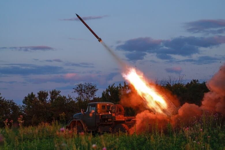 Ukrainian forces fire rockets toward Russian positions, near Bakhmut, Ukraine.