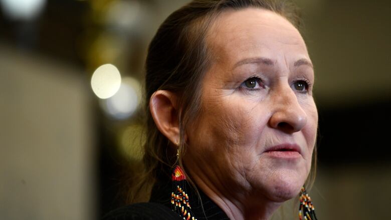 Premier of the Northwest Territories Caroline Cochrane participates in an availability after speaking with Prime Minister Justin Trudeau, not shown, on Parliament Hill in Ottawa, on Friday, Dec. 9, 2022.