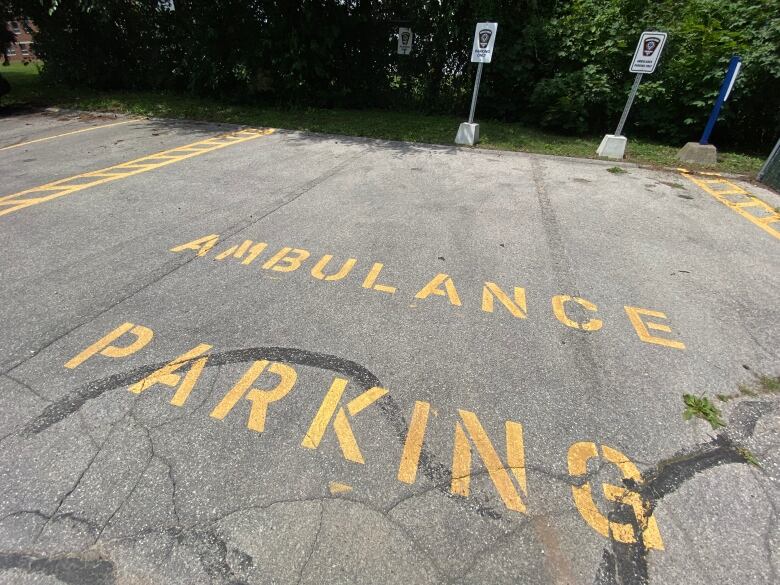 Ambulance parking text on the pavement