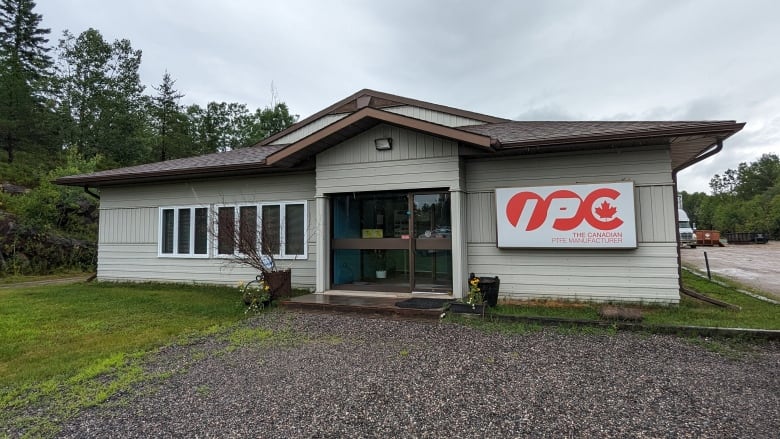 The outside of a single-storey building with a sign that says IPC.