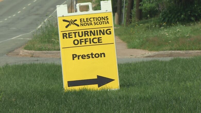 A sign points toward the returning office for the Preston byelection.