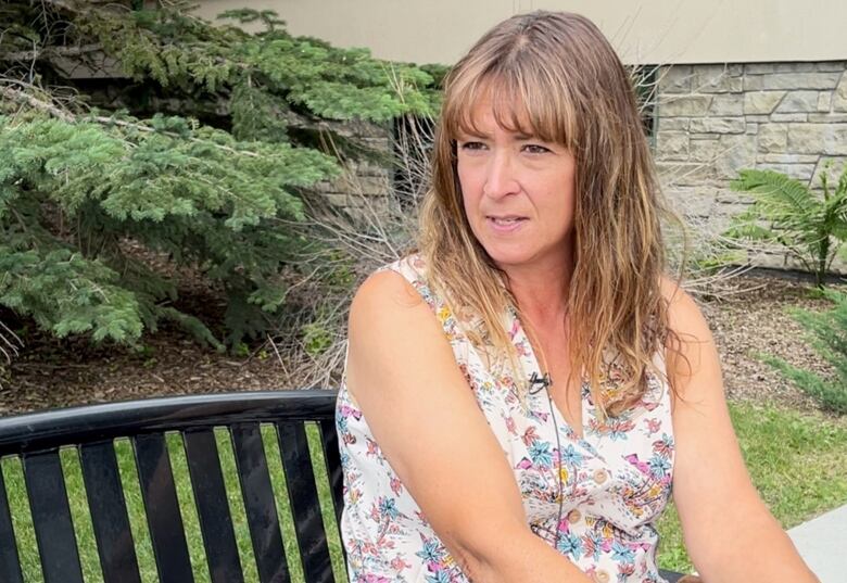 Benita Estes is pictured outside town hall in High River, Alta.