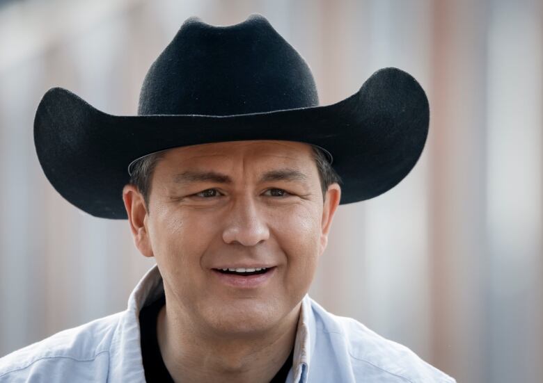 Conservative Party leader Pierre Poilievre wears a cowboy hat during the Calgary Stampede parade in Calgary.